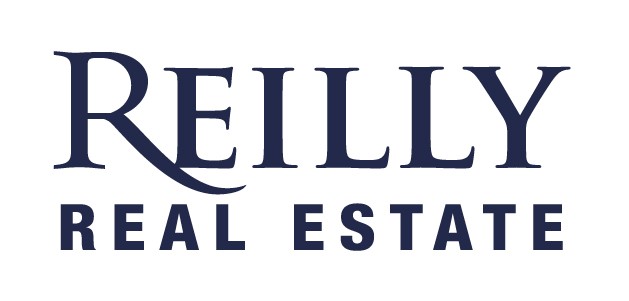 Tonia Stutz - Reilly Real Estate Logo